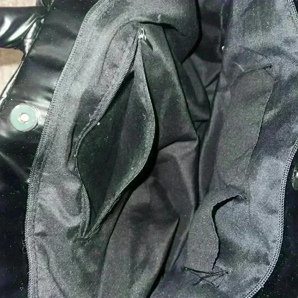 Black puffer quilted travel tote